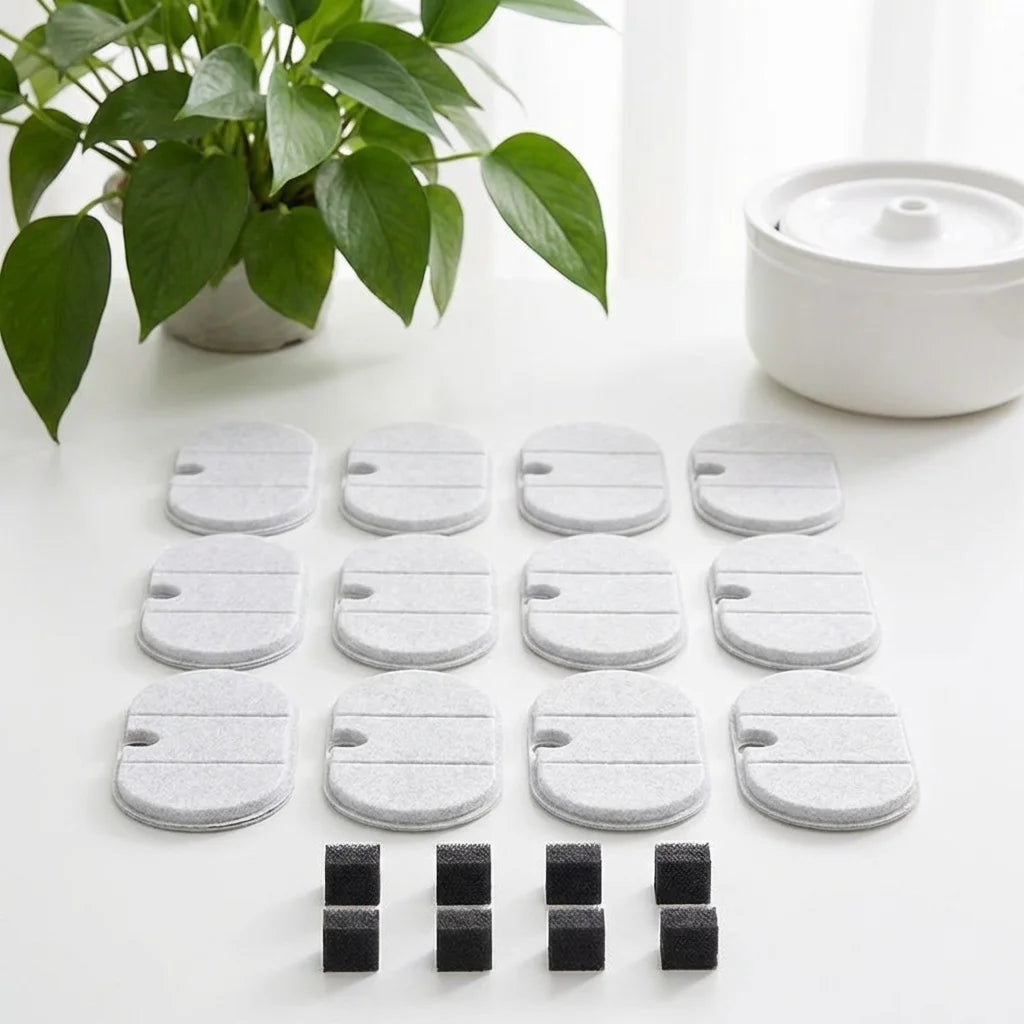 PawQuiet replacement filters flat lay with plant